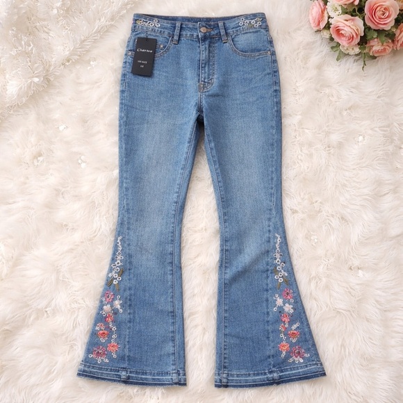 Denim - Women’s XS 2/4 vintage medium wash flare raw hem jeans with floral embroidery​